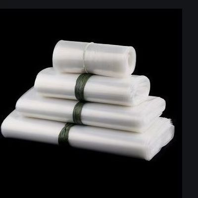 Ondersluiting, warmtsluiting, koudsnijmachine voor het maken van plastic zakjes voor supermarkten, platte zakjes